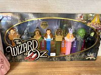 Front view of sealed Wizard of Oz PEZ Collector's Series box showing seven character dispensers