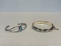 Both sterling bracelets side by side