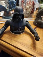 Front view of Darth Vader topper showing torso, arms, base