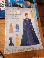 Front cover showing Padme doll and various costumes