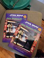 Front covers of both Jedi Punch-Outs books