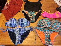 Overview of all swimwear pieces on table