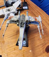 Front view of X-Wing mounted on display stand