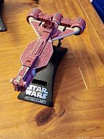 Top view of maroon Republic Cruiser on display stand