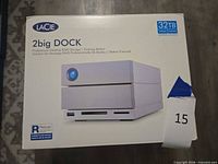 Front of sealed retail box showing product image and 32 TB capacity label