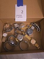 Box containing 14 assorted wristwatches