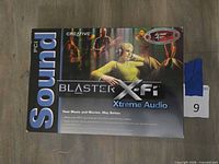 Front of sealed retail box showing branding and product images