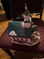 Front angle showing steeple, roof texture and snow accents