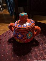 Full view of sugar bowl with lid on