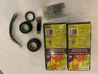 All items laid out: two foam bricks, tapes, wires