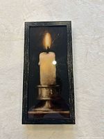 Front view of framed candle print showing image, frame style and condition