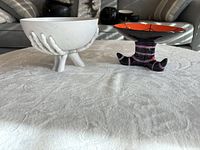Front view of both decorative bowls showing design and size