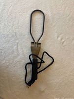 Full view of charcoal lighter, cord visible