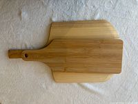 Both bamboo boards stacked to show sizes and shapes