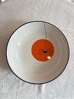Top view showing interior spider motif and color scheme