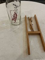 Bottle and ladder toy side by side