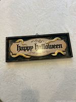Front view of rectangular Halloween plaque