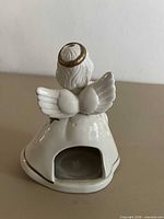 Rear view showing candle opening and wings