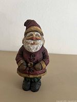Front view of the resin Santa gnome figurine