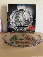 Platter displayed in front of original box showing holiday design and edge detail