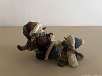 Two-snowman resin figurine showing size and detail