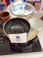 Stacked glass mixing bowls, ceramic bowl, bone china bowl, wooden goblet