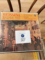 Stack of classical vinyl LP records, top title Rossini William Tell and Other Famous Overtures visible