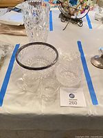 Group view of vase, bowls and creamer