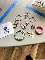 Group shot showing all earrings on table