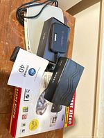 Group shot showing all five electronic items stacked on table