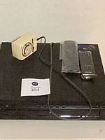 Top view of Sony 5-disc DVD carousel with remotes and timer placed on top