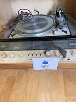 Front view of Kenwood KS-707 with Dual 1209 turntable showing controls and platter