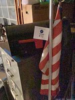 Mailbox and American flag on pole together