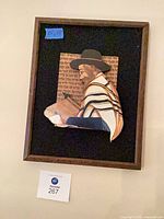 Full view of framed 3-D relief artwork