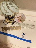 Top view showing lamp, ceramic plate, glass DAD sign, metal MOM sign