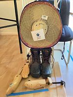 Sombrero, pair of boots, three shoe stretchers overview