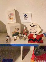 Group shot showing all boxed and loose ornaments plus Charlie Brown plush
