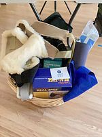 Entire basket with assorted braces, boxes visible