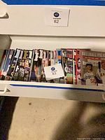 Drawer showing full assortment of magazines standing upright