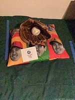 Pillow with Ohtani print, glove and baseball grouped