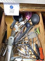 Drawer overview showing multiple utensils