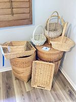 Group shot of two tall hampers, multiple baskets stacked