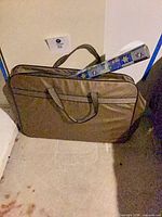 Carrier bag with boxed roll inserted