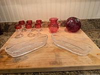 Entire lot: six cordial glasses, small pitcher, art glass orb, two clear relish dishes