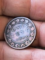 Reverse showing ONE CENT 1884 within maple-leaf wreath