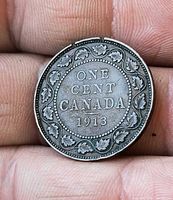 Reverse of 1913 Canada large cent showing denomination, maple leaf wreath, date