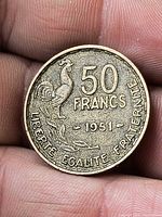 Reverse of 1951 50 francs coin with rooster design