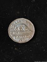 Reverse side showing beaver design, denomination, country, year
