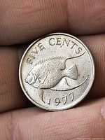 Reverse side with blue angelfish and date 1977