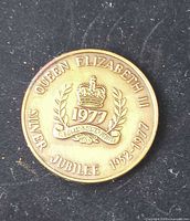 Obverse of medallion showing Queen Elizabeth II Silver Jubilee design